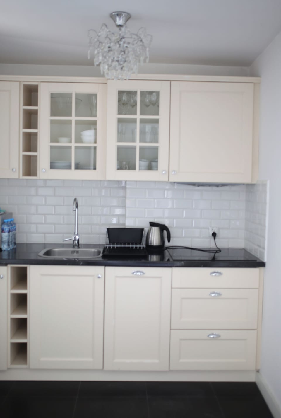 Family Apartment | Private kitchen | Fridge, electric kettle, highchair