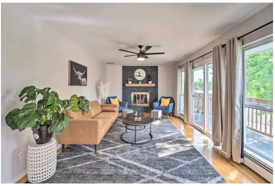 Giant living room with large TV, mountain views and a private balcony! 
