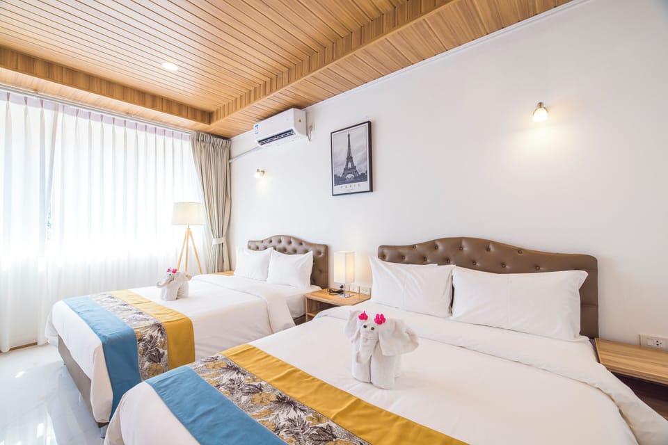 Deluxe Twin Room, Balcony | Premium bedding, down comforters, memory foam beds, in-room safe