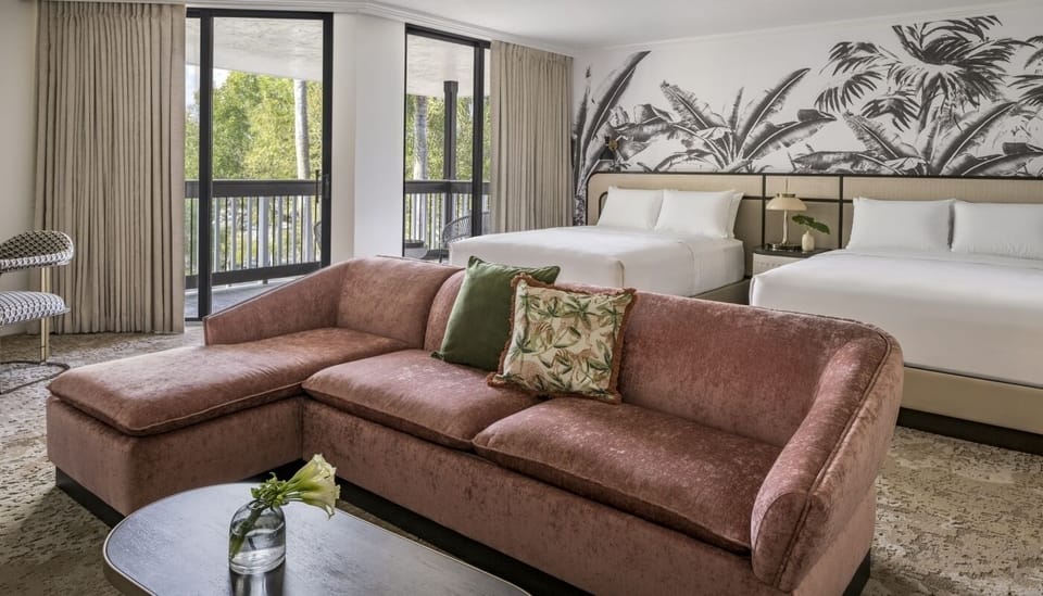 Lounge together after adventures in a chic, open-concept suite.