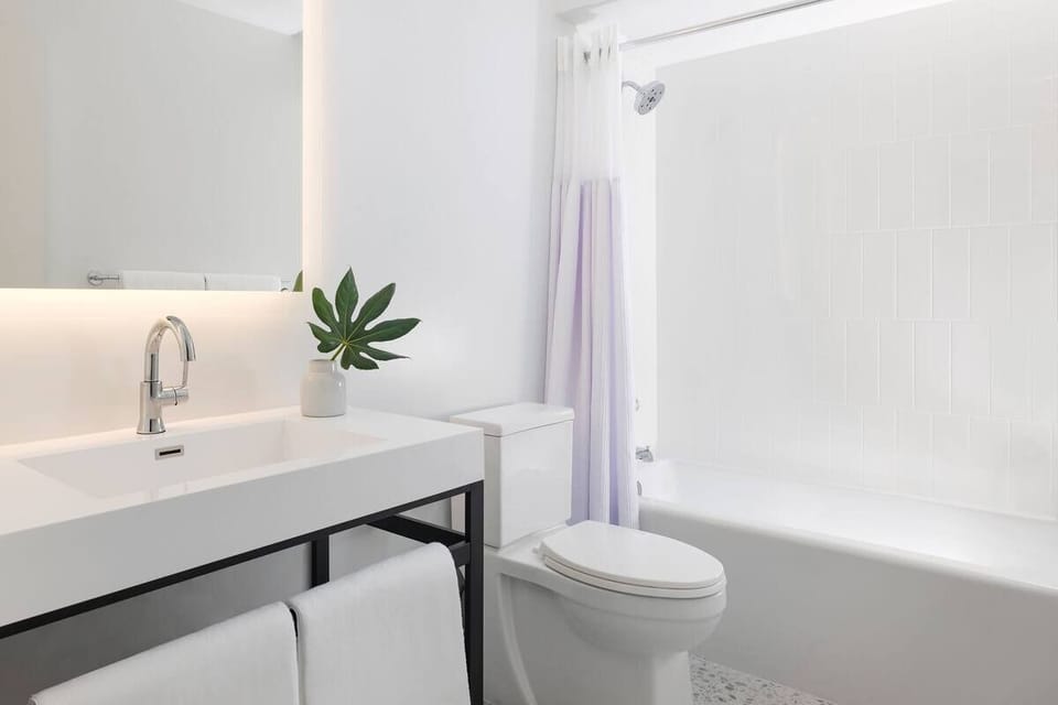 Refresh in a spotless bath with bright, modern finishes.