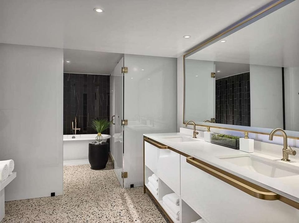 Refresh in a spa-like bath with double sinks and soaking tub.