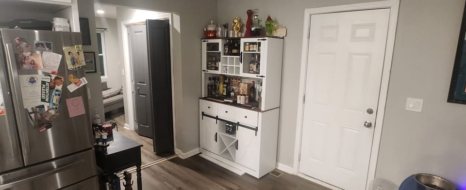 open area in kitchen heading to master bedroom