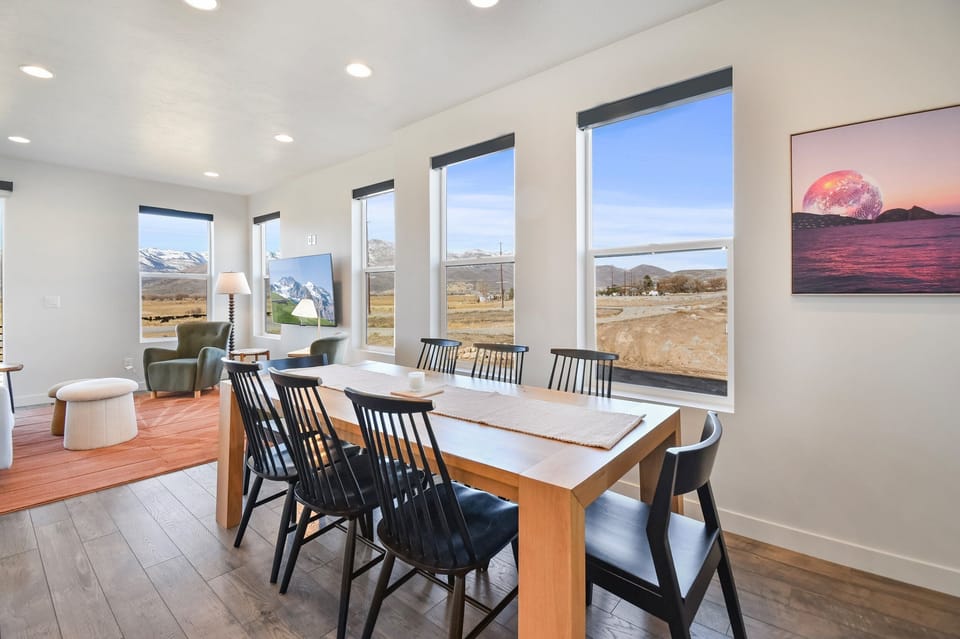 Nordic Getaway Dining room has seating for 8 at the dining table plus another 3 at the kitchen island