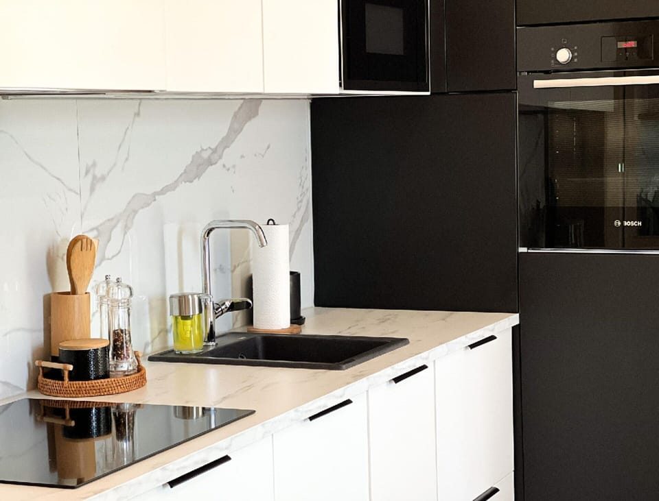 Villa | Private kitchen | Highchair, cleaning supplies