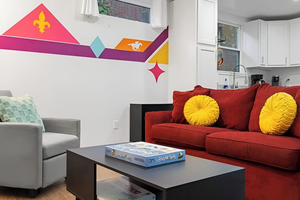 Unique wall mural adds an artistic vibe to the living space.