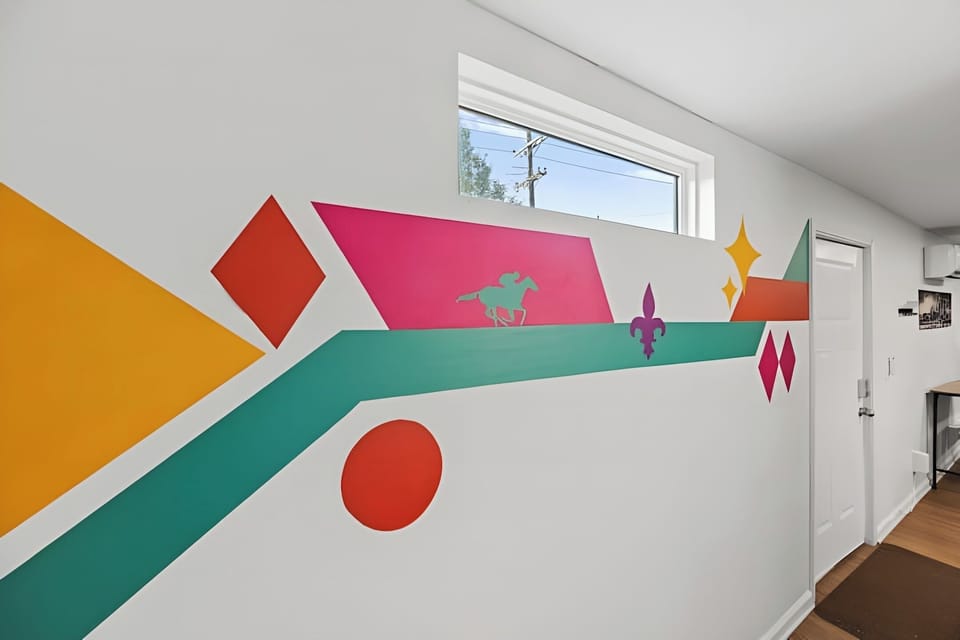 Check out the custom wall art that celebrates local horse racing culture.