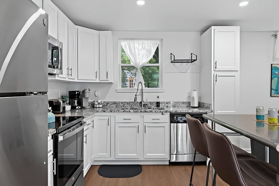 Cook your favorite meals in a kitchen stocked with modern appliances.