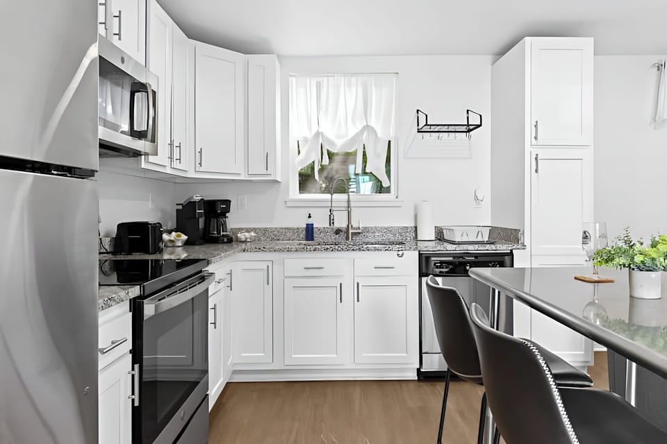 Whip up a delicious meal in our sleek kitchen with plenty of counter space.
