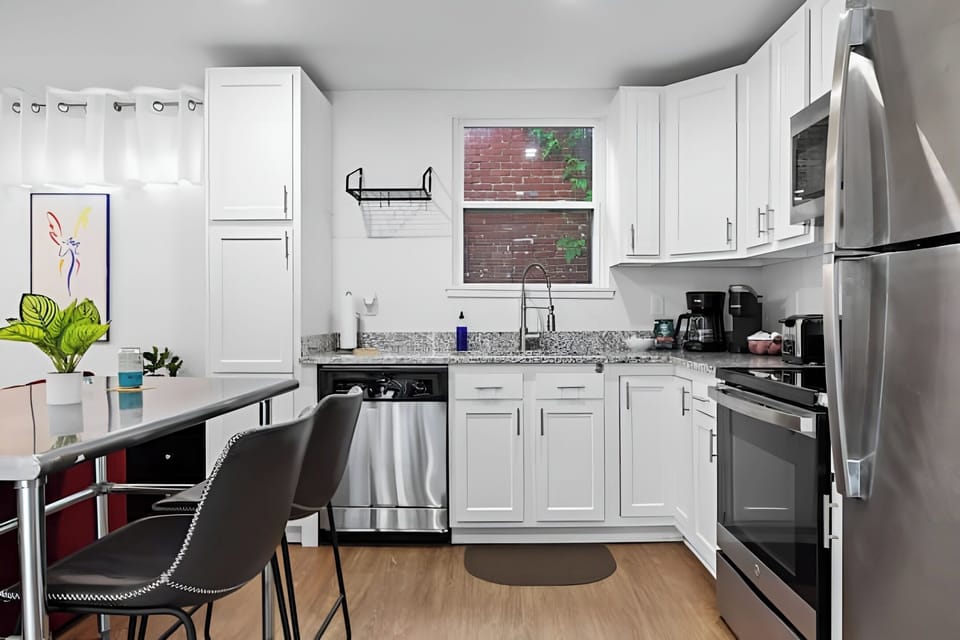 Cook up a storm in the fully equipped kitchen with sleek stainless steel appliances.