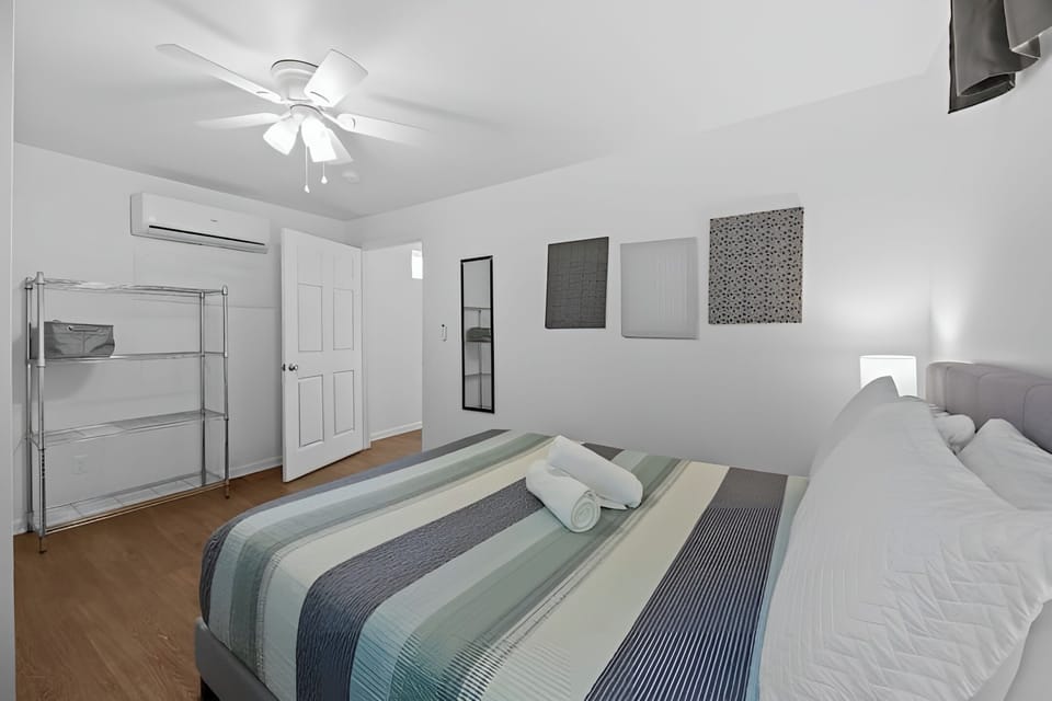 Bedroom 2 - Unit 2: Enjoy modern comforts in the eco-friendly ambiance of our home