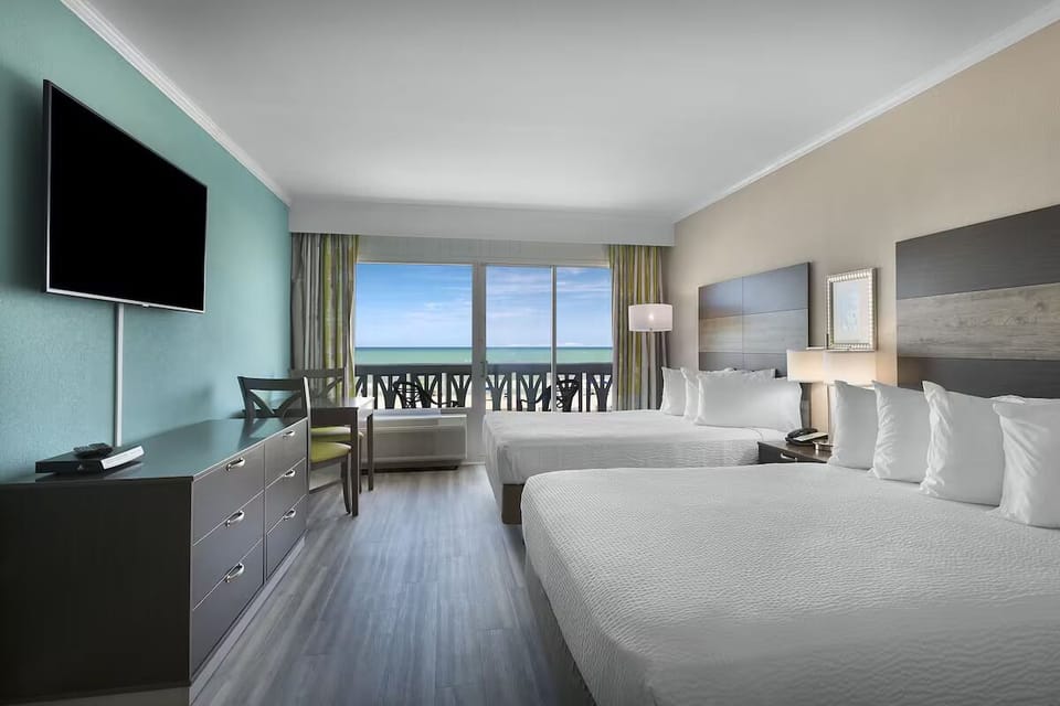 Wake up to ocean views from crisp, cozy beds.