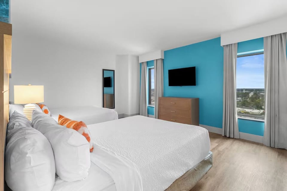 Stretch out comfortably with bright windows and plush pillows.