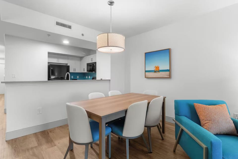 Share long dinners under warm light at the roomy table.