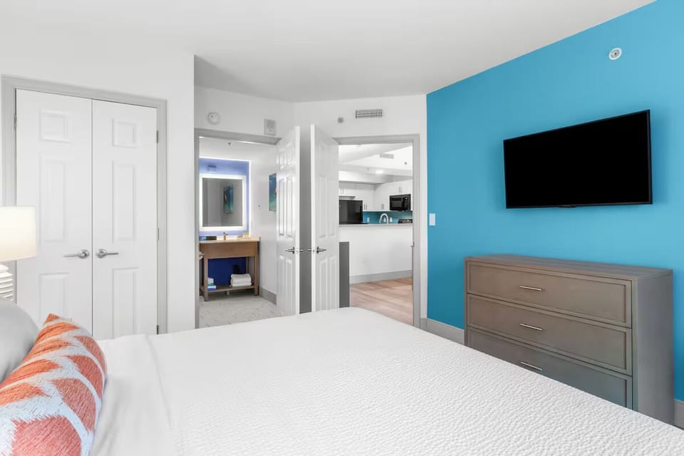 Drift off in a calm retreat with TV and soft lighting.
