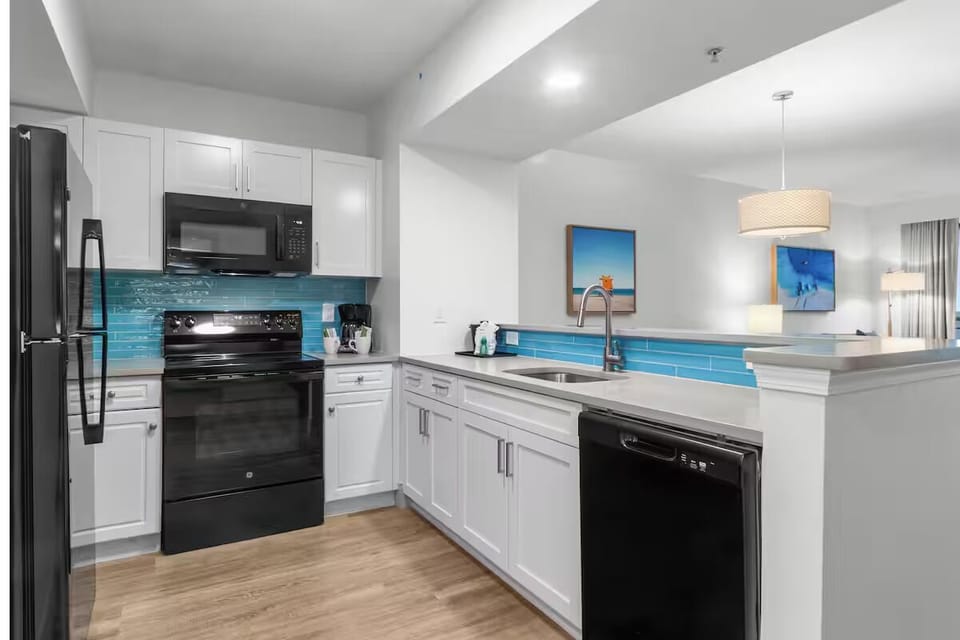 Cook with ease in the sleek kitchen and bright breakfast bar.