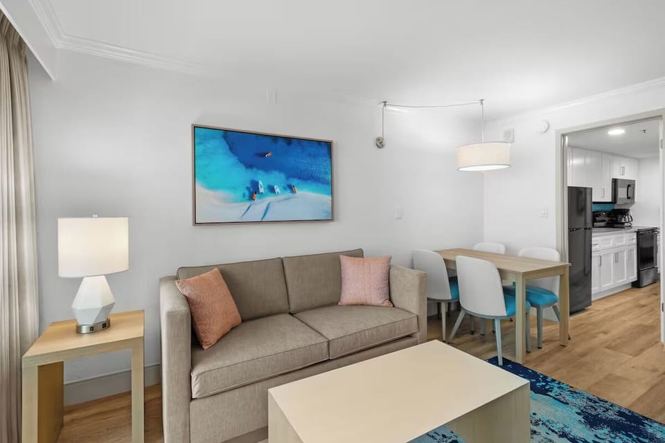 Lounge together in the airy living area after beach adventures.