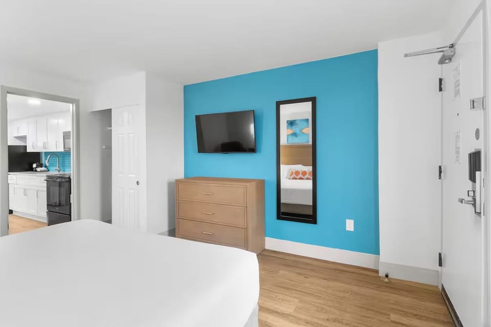 Kick back with in-room TV and plenty of storage space.