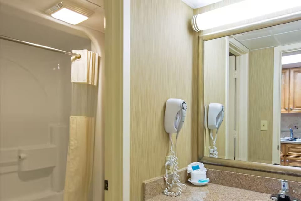 Refresh easily with bright vanity space and shower-tub combo.