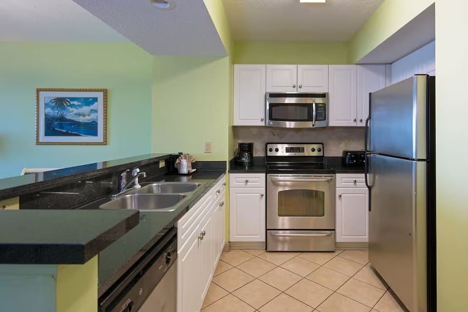Cook effortlessly with roomy counters and full stainless appliances.