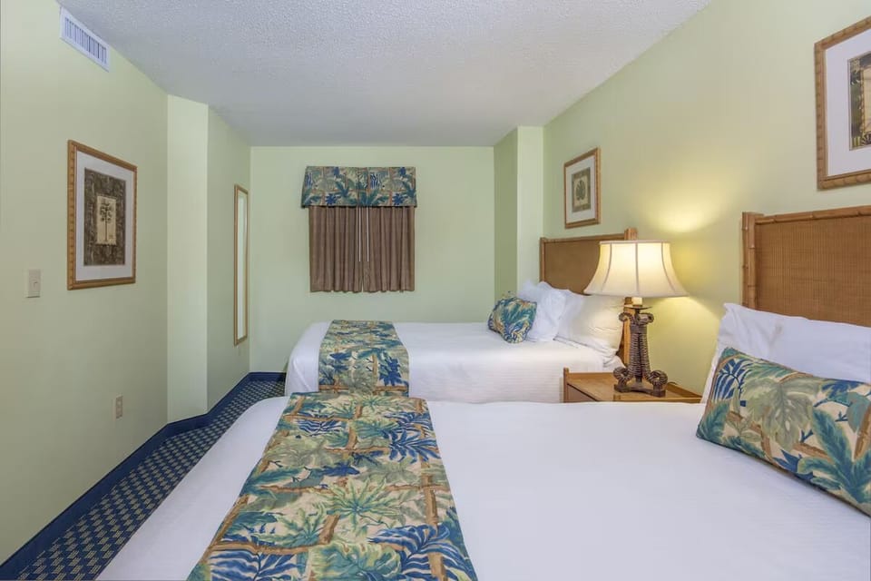 Rest comfortably in twin beds after a full day seaside.
