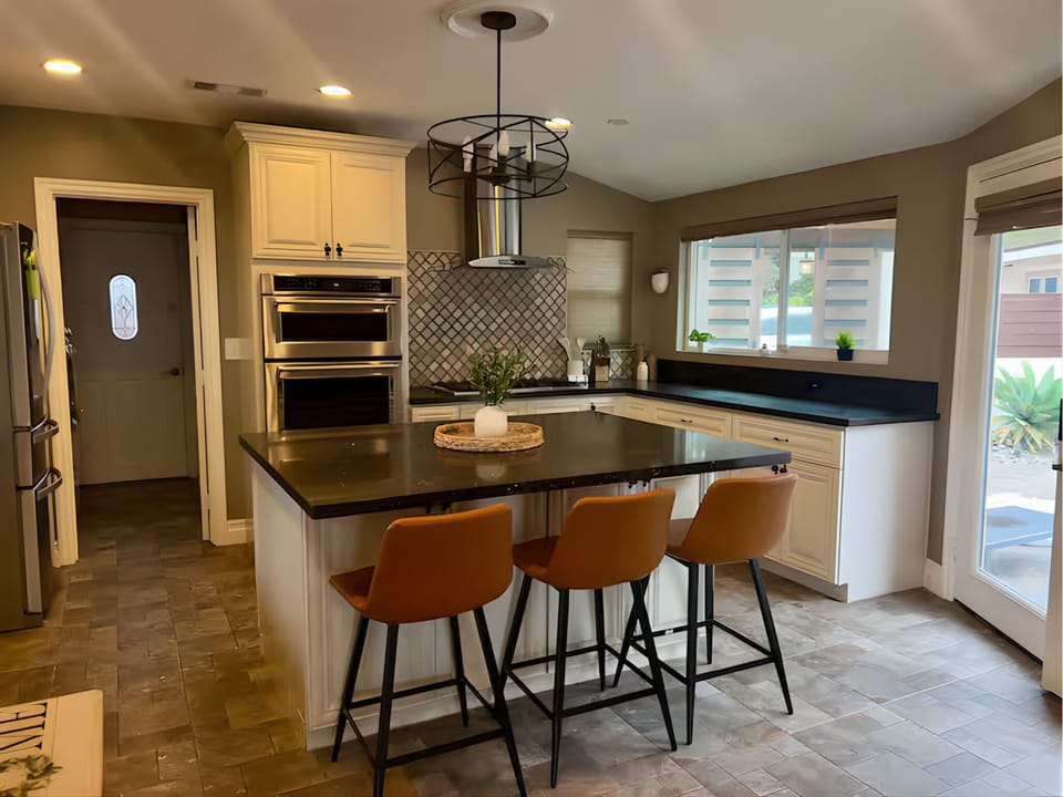 A kitchen island ready for snacks, stories, and sipping.