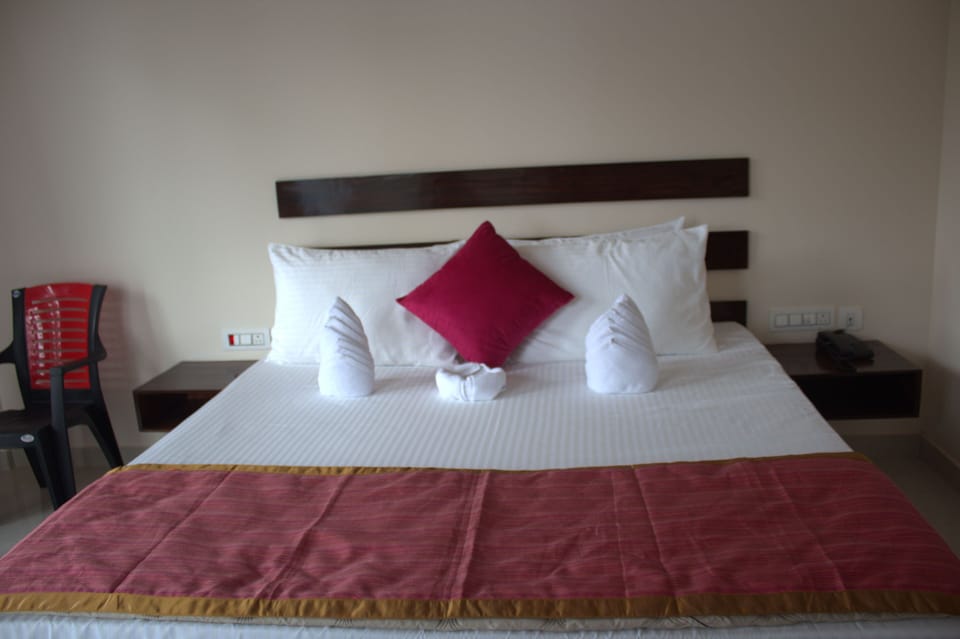 Premium bedding, blackout drapes, iron/ironing board, free WiFi