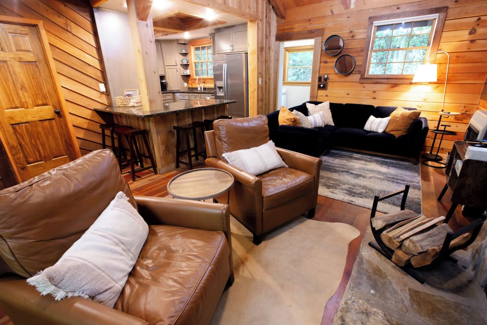 Lounge in the comfortable leather recliner chairs for conversation fireside.