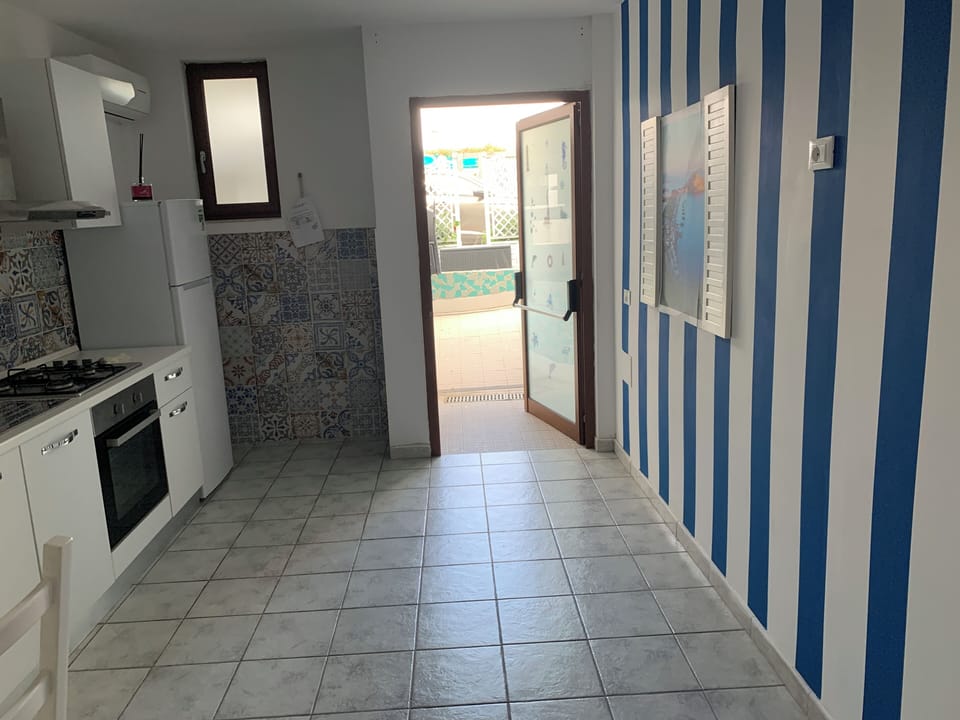 Townhome, 1 Bedroom, Kitchen, Ground Floor | Private kitchen | Cookware/dishes/utensils