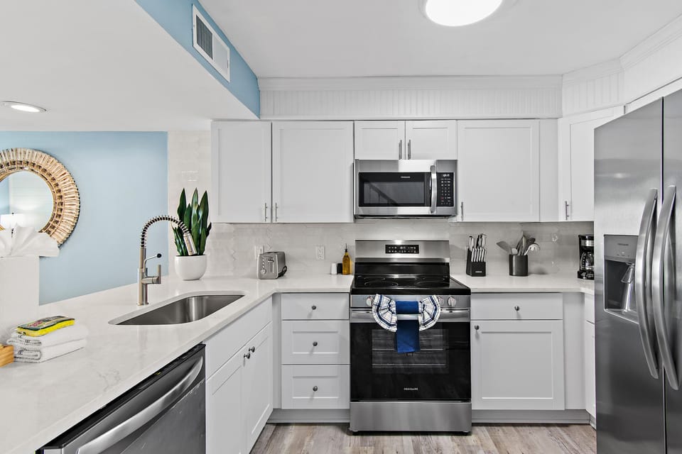 Cook delicious meals in the REMODELED Kitchen while overlooking the Gulf of Mexico