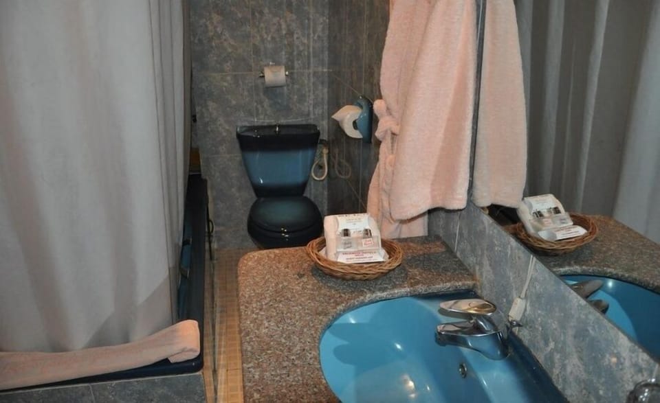 Family Room, Balcony, City View | Bathroom | Free toiletries, hair dryer, towels, soap