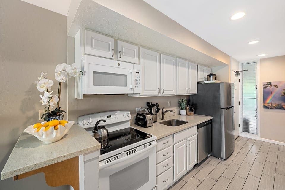 Enjoy cooking in your fully furnished kitchen with stainless steel appliances