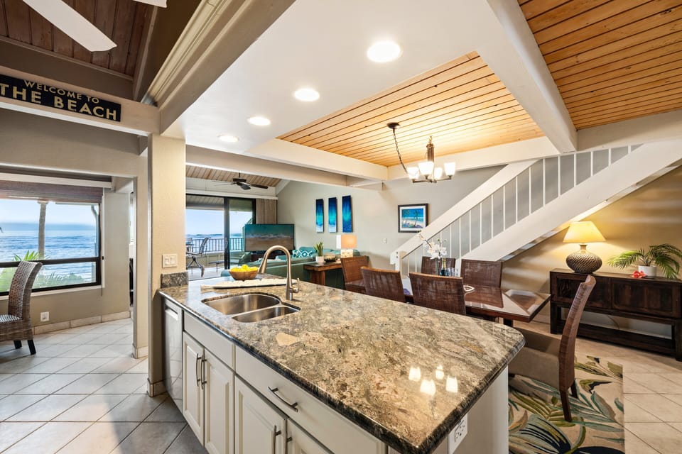 Spacious kitchen with plenty of counter space and a seamless flow into the dining area