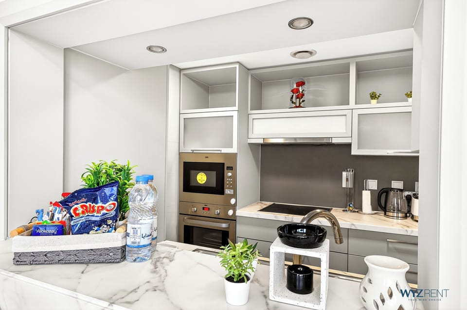 Standard Apartment, City View | Private kitchen | Coffee/tea maker, electric kettle, toaster
