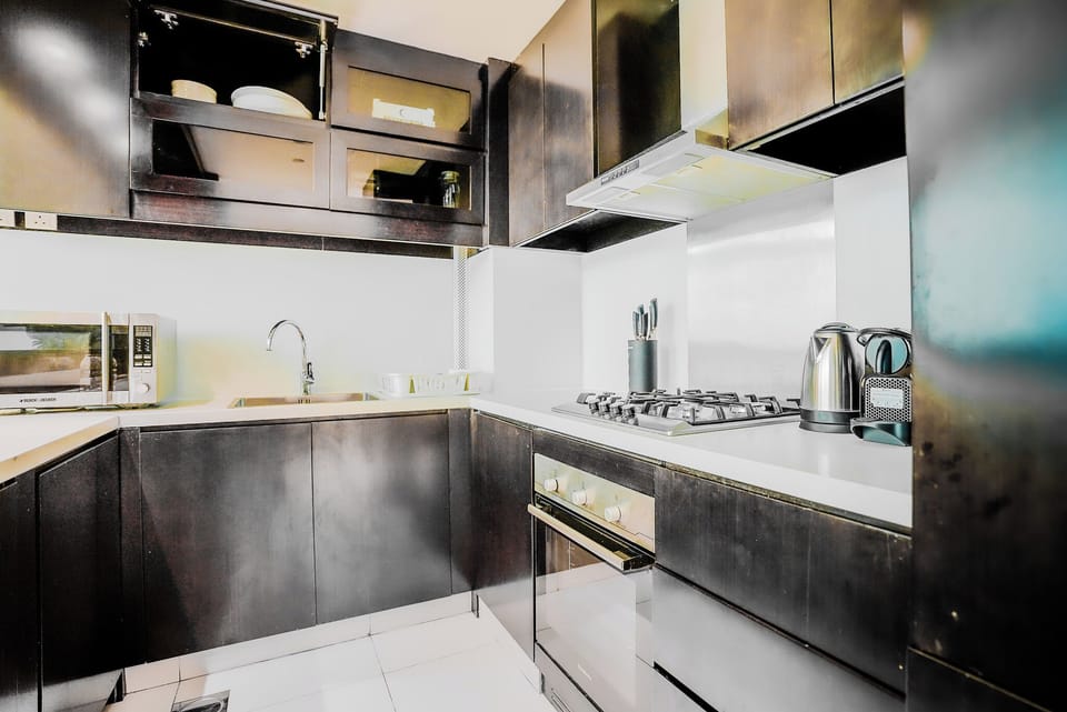 Deluxe Apartment, Balcony, City View | Private kitchen | Espresso maker