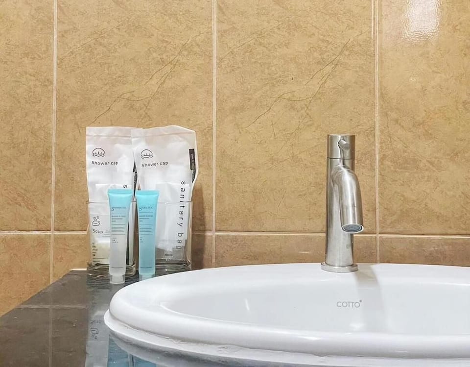 Studio, Balcony, City View | Bathroom | Shower, hair dryer, towels, soap