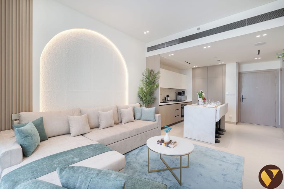 Luxury Apartment, Balcony, City View | Living room | 65-inch Smart TV with cable channels