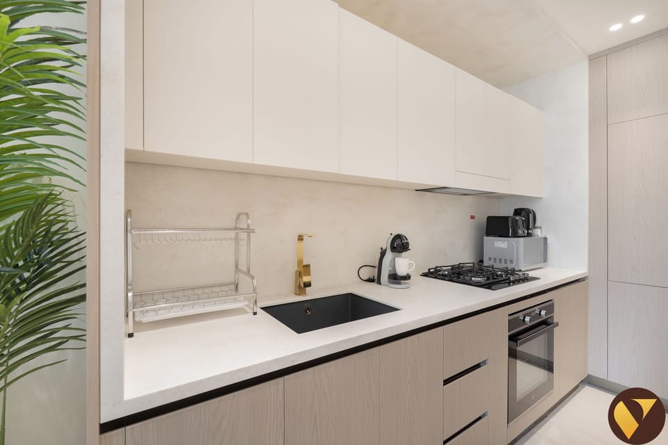 Luxury Apartment, Balcony, City View | Private kitchen | Full-size fridge, microwave, oven, stovetop