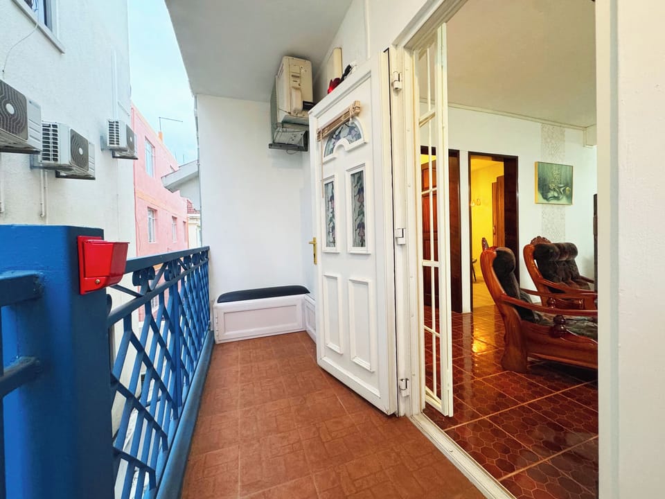 Balcony with seating area and smoking area