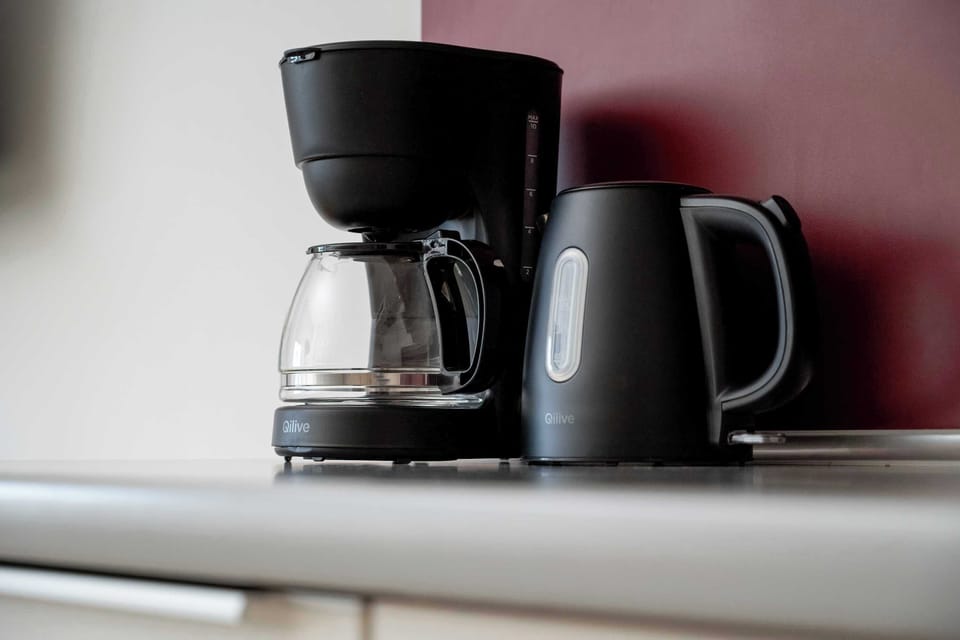 Coffee machine and kettle provided for guests.