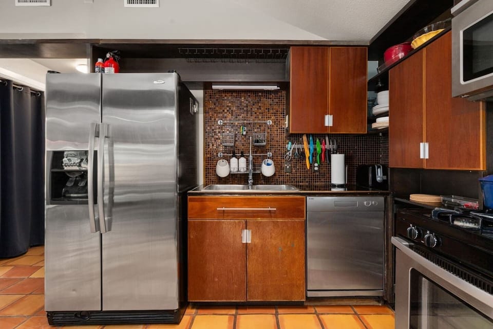 Well-equipped kitchen with generous counter space, making meal prep easy and convenient.
