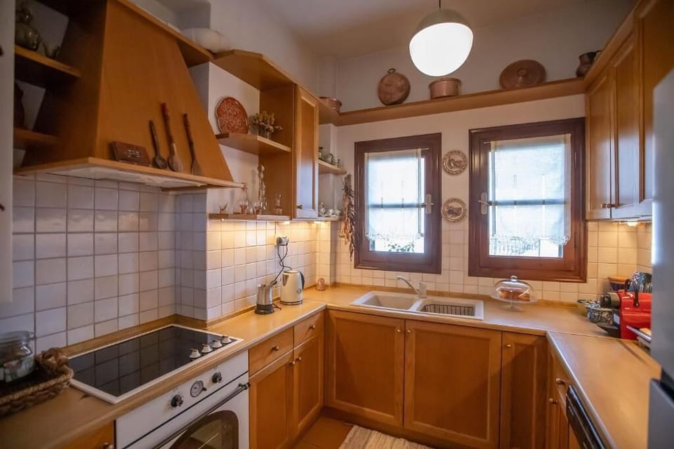 Fully Equipped Rustic Kitchen with Wooden Cabinets