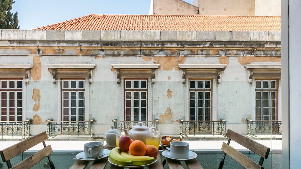Enjoy a morning coffee or evening drinks, while taking in Lisbon's sun and breeze in the balcony #sunny #breeze #portugal #pt #lisbon