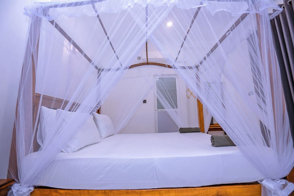Deluxe Double Room, Garden View | Desk, laptop workspace, free WiFi