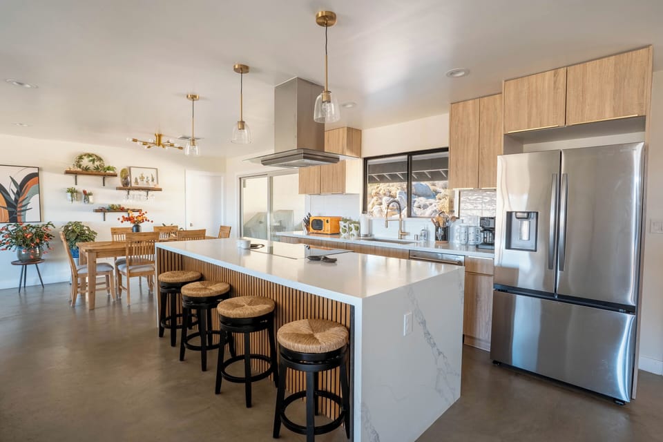Full kitchen, stocked pantry and plenty of of seating for everyone!