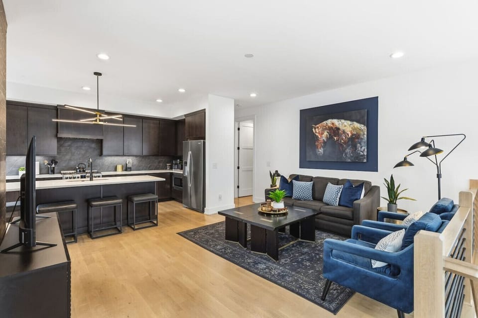 Open living room on the 2nd floor with a queen sleeper sofa and a Smart TV with all the streaming apps.