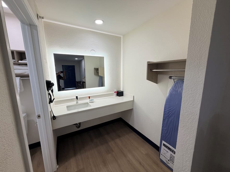 Combined shower/tub, hair dryer, towels, soap