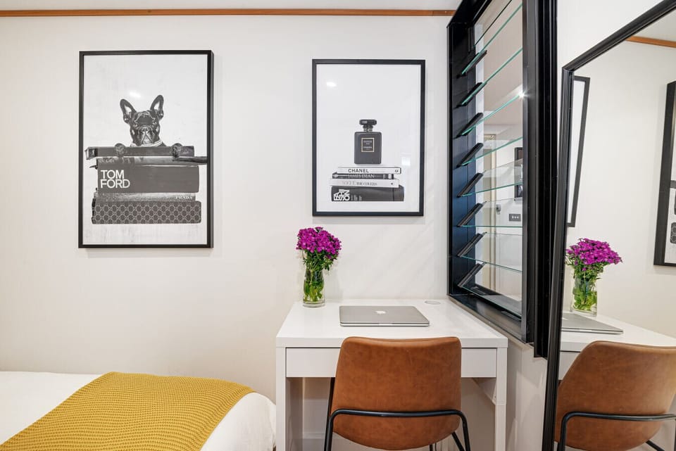 Bedroom 2 with double bed and dedicated workspace