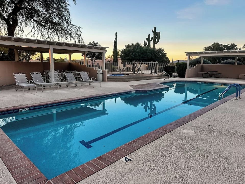 Community lap pool (not heated) and hot tub, available for guests to use during your stay
