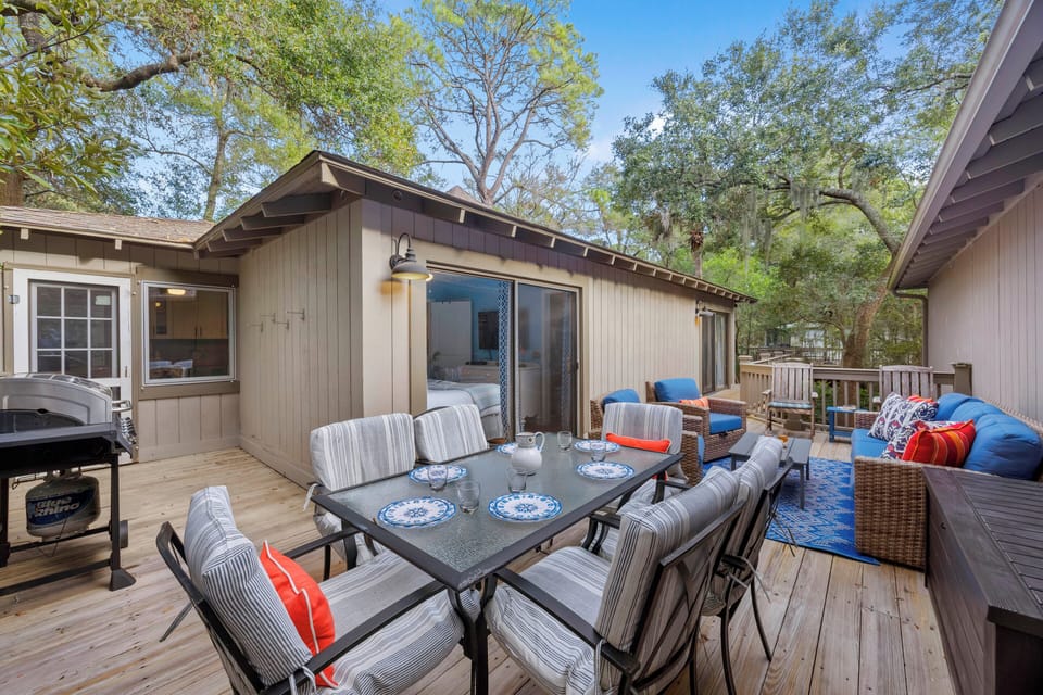 Welcome to 1055 Sparrow Pond! Spacious deck with plenty of seating options.